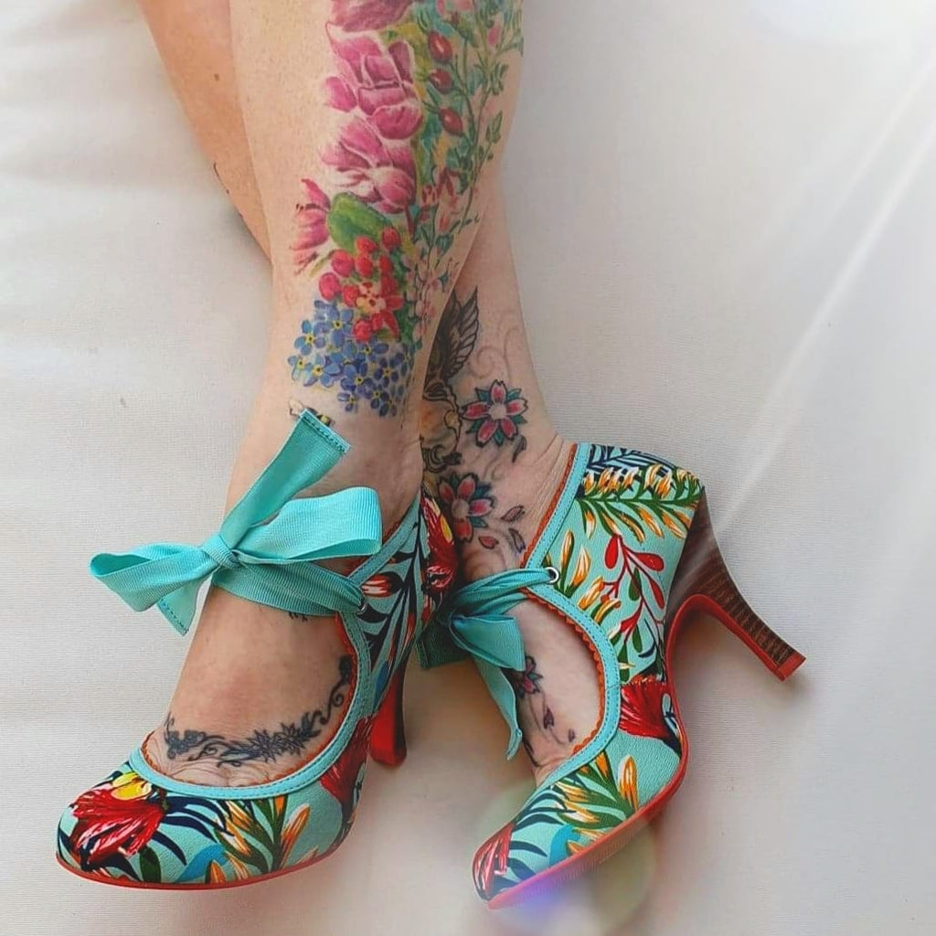 Ruby Shoos and floral Tattoos... a perfect combination of pretty and quirky!  Shoes and Tattoos... it even rhymes!